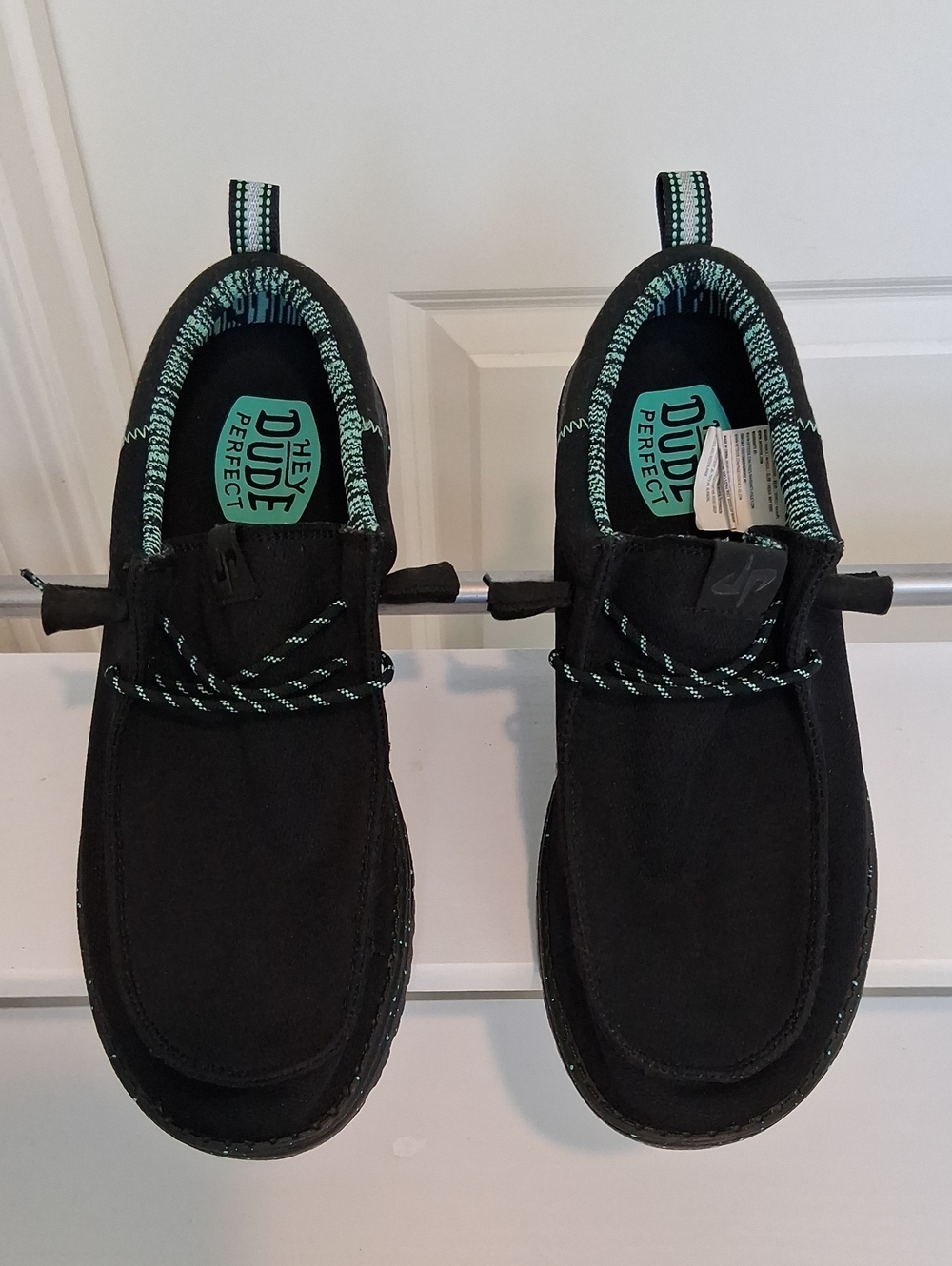 0Hey Dude Mens  Black with Teal Accent Slip-On Sneakers